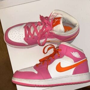 Pink white and orange air jordan’s